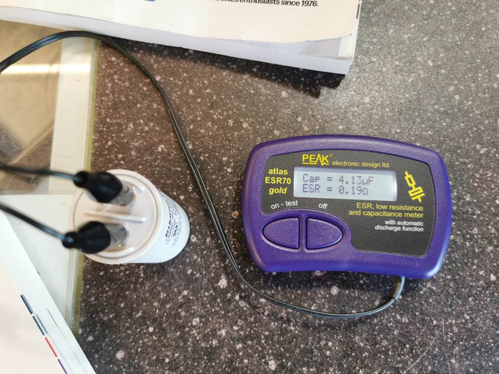 Capacitor's capacity checked using capacitance meter Peak Atlas ESR70 for Guardian Garage Door Opener 21230L